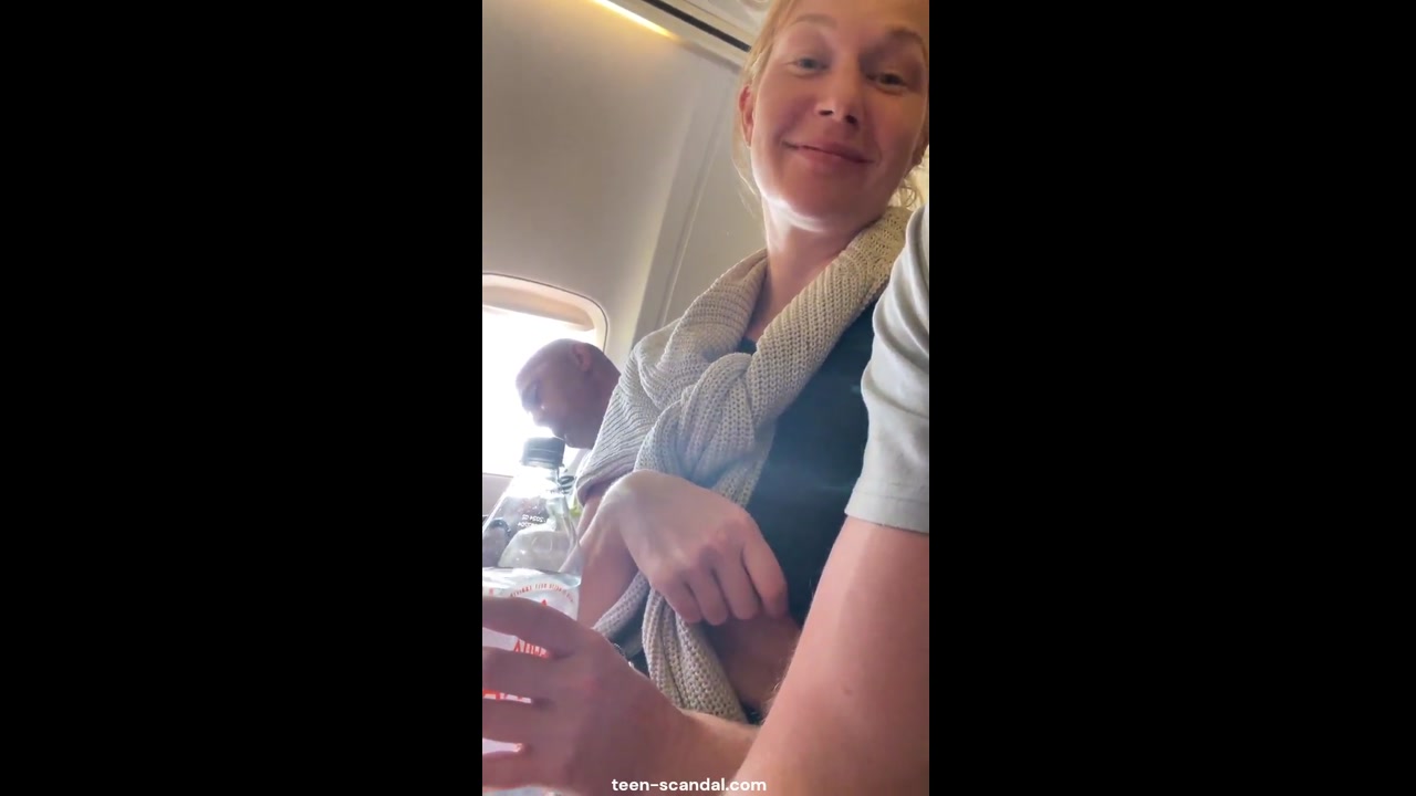 Red haired girlfriend flashed on the plane 02