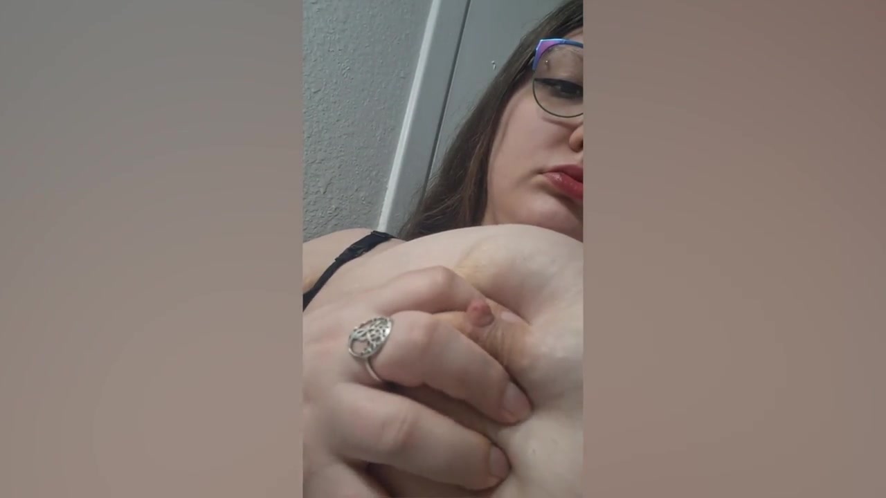 Chubby mom with glasses films herself milking her huge tits 01